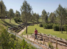 <a href="https://landscapearchitecturebuilt.com/staging/forest-path-roques-blanques">Forest path in the Roques Blanques Cemetery</a>, <br>Barcelona, Spain